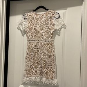 White and tan doily textured overlay mini dress